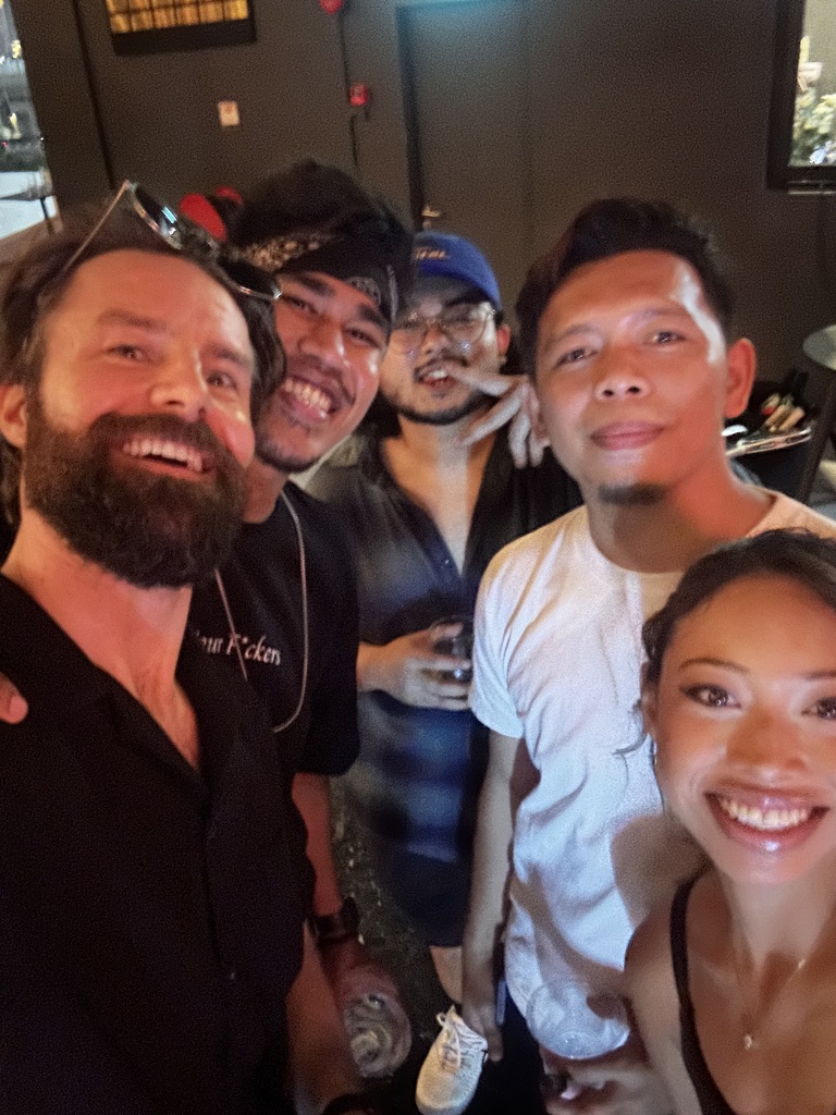 Michael, Deha, and friends together in Shanghai