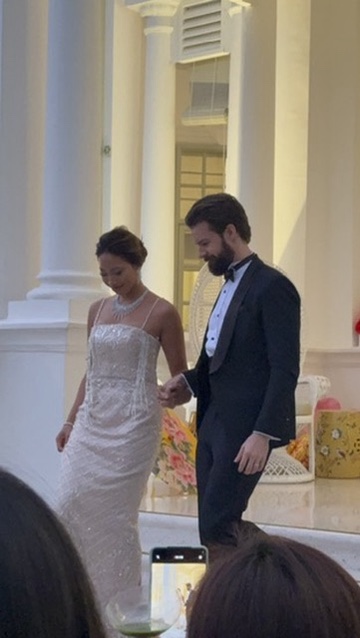 Michael and Deha walking together after the ceremony