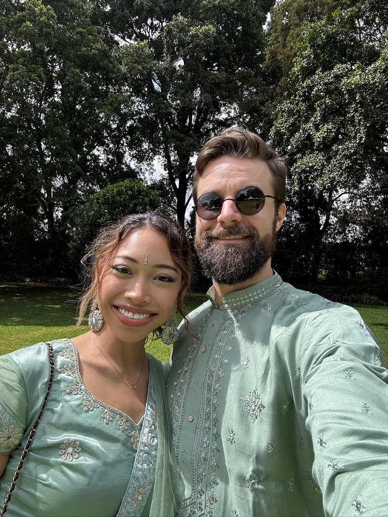 Michael and Deha dressed for a wedding celebration in Kenya