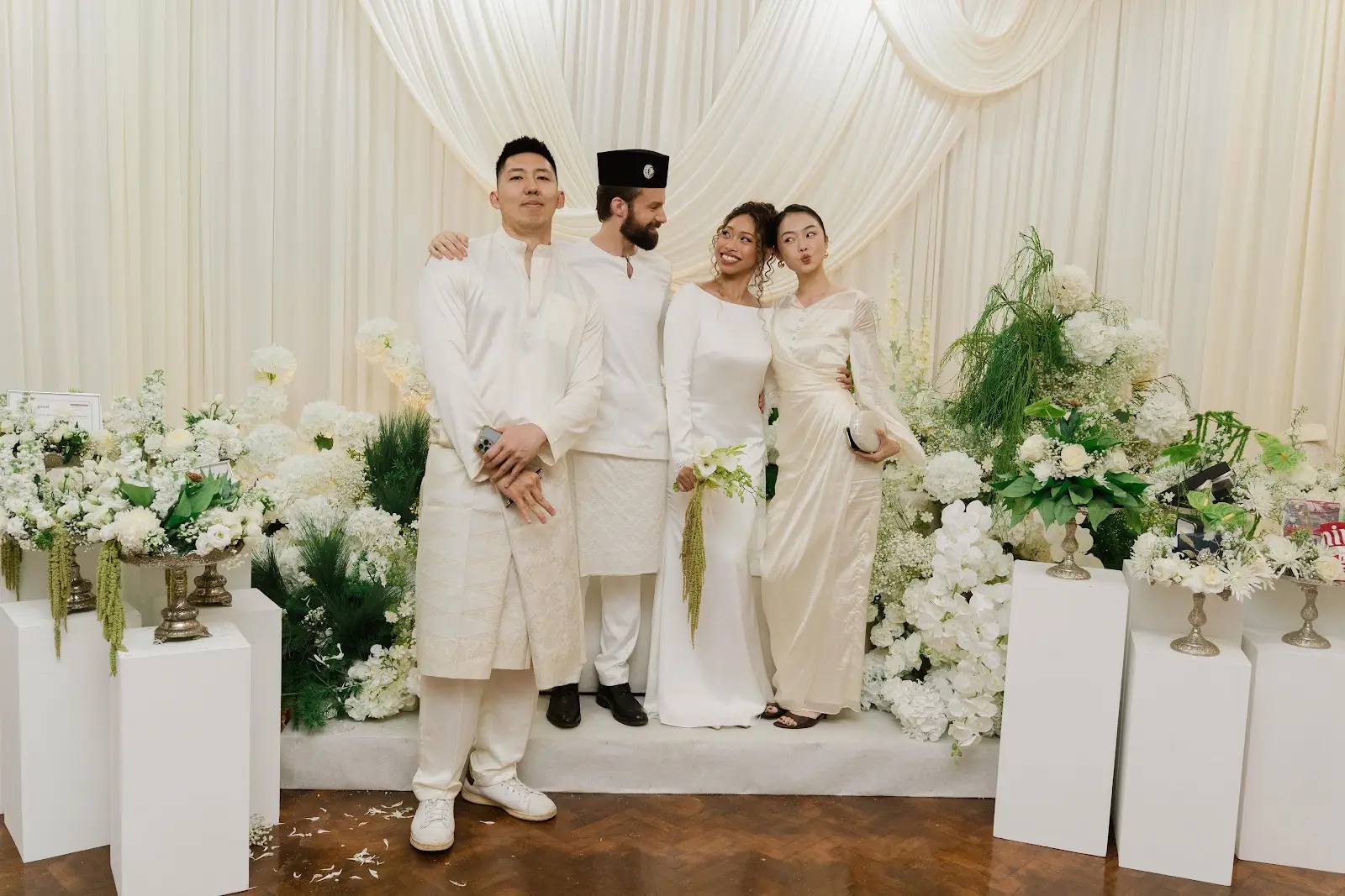 Michael and Deha together in white after the Nikah