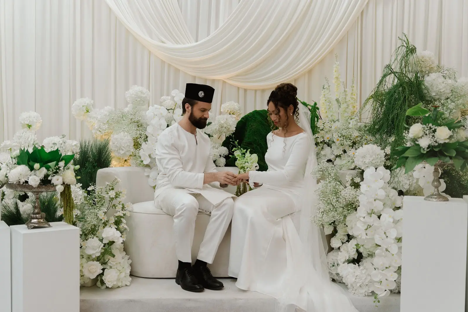 Michael and Deha seated together after the Nikah