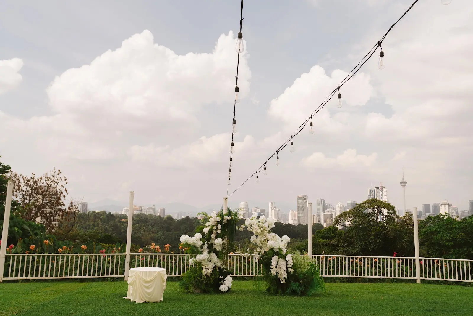 The white-clad Nikah gathering seen from above on the Kuala Lumpur lawn