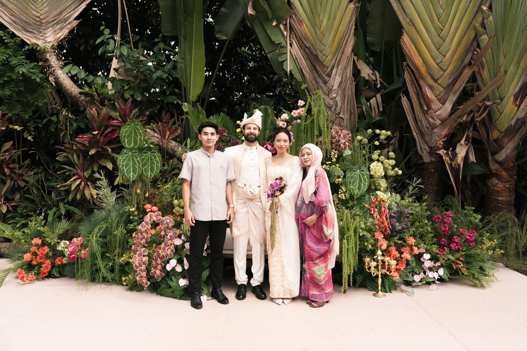 Michael and Deha with family at the Sanding celebration